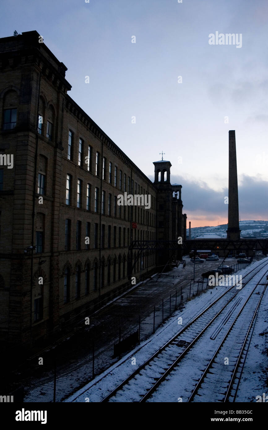 Snow covers the ground at Salts Mill, Saltaire, West Yorkshire, UK