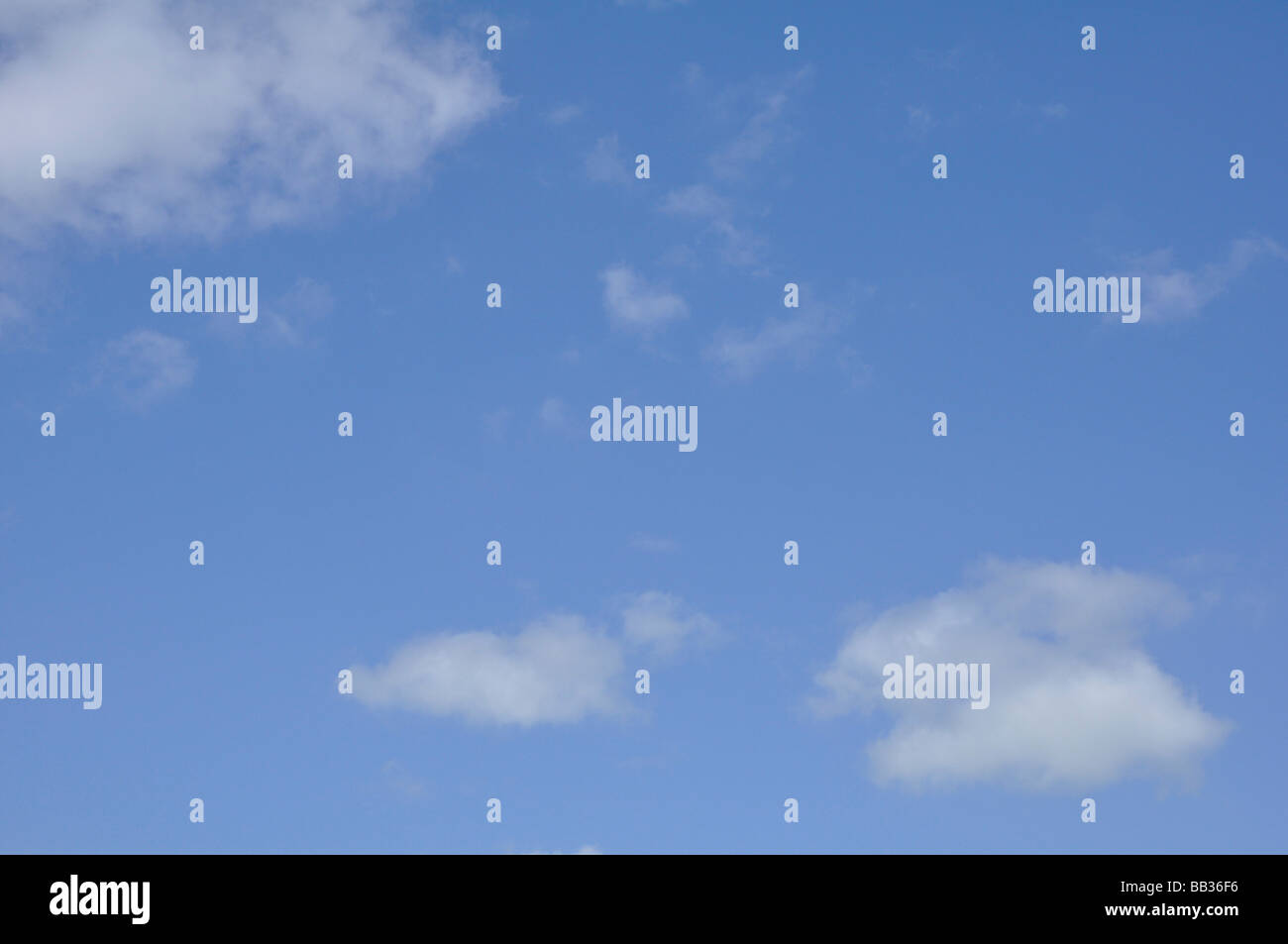 Blue sky with fluffy white clouds ( small cumulus Stock Photo - Alamy