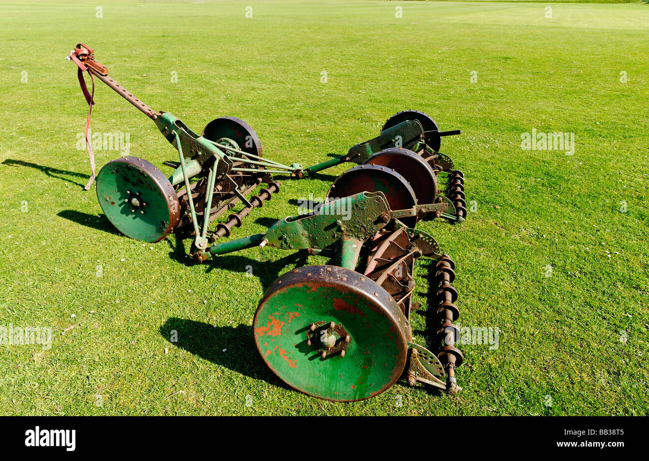 Lawnmower on sports field Stock Photo