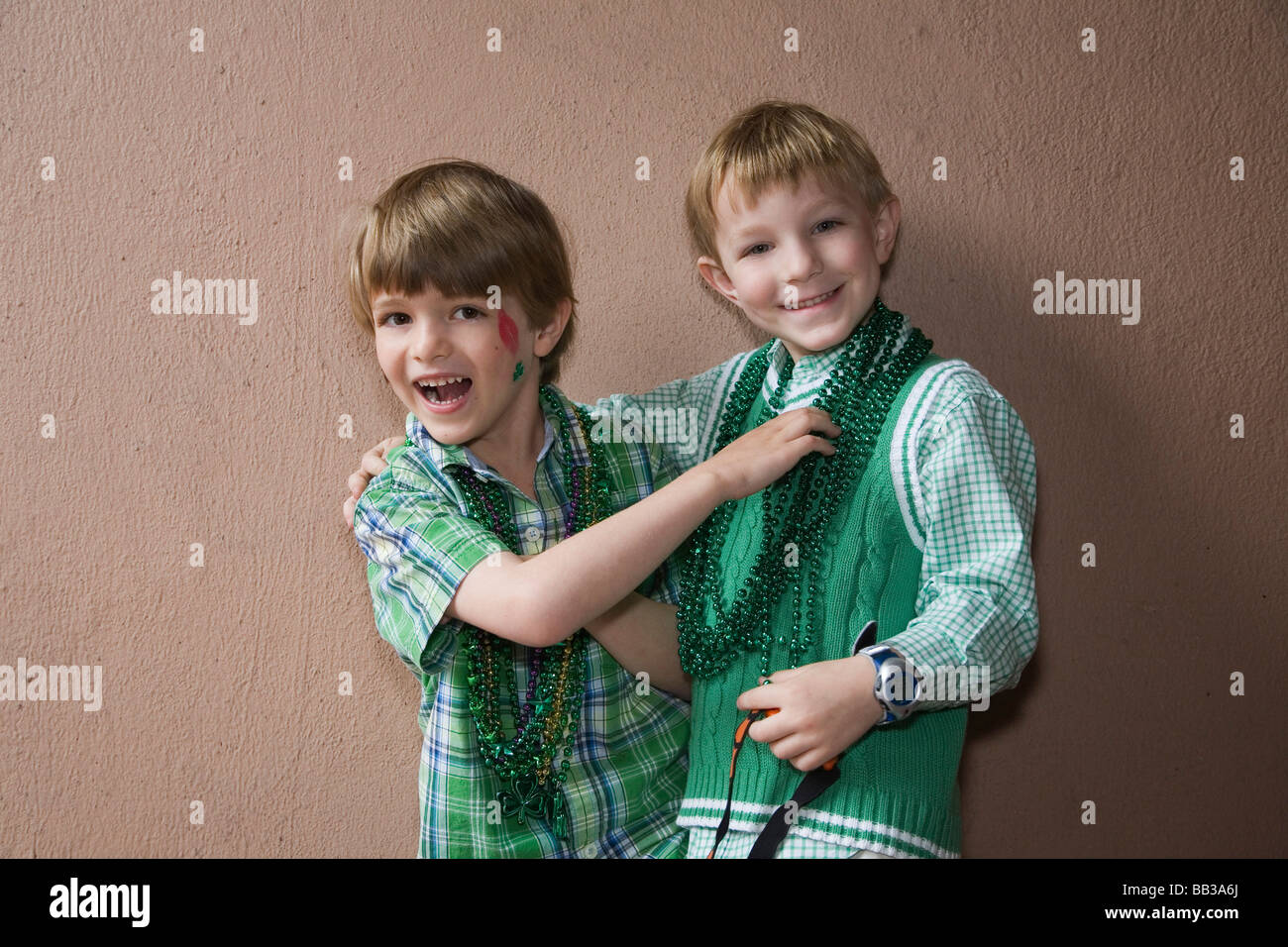 USA; Georgia; Savannah.  Two young boys celebrating St. Patrick's Day. (MR) Stock Photo
