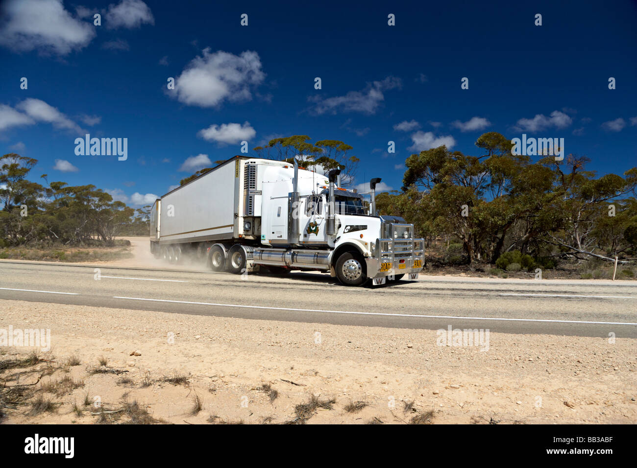 Road Train leaving a rest stop traveling across South Australia to