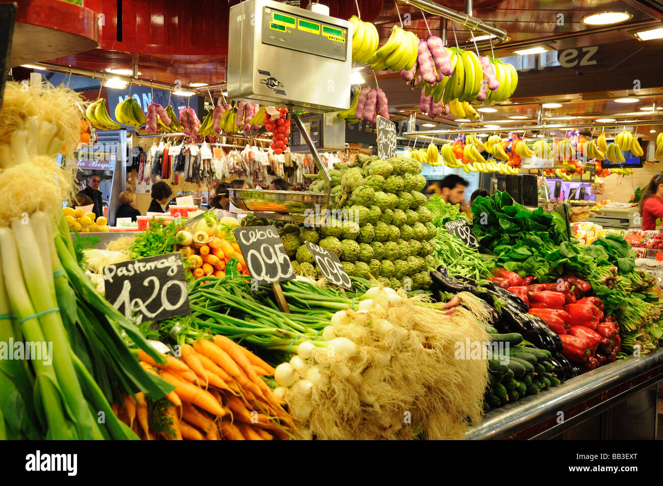 Fruits and vegetables stand in La Boqueria market, Barcelona Spain