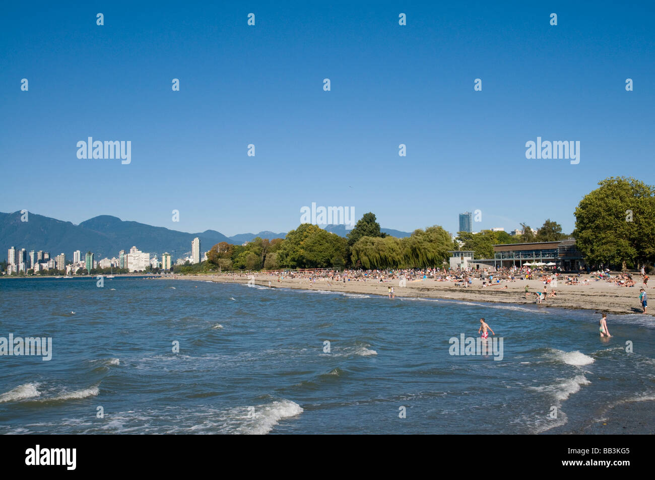 Kitsilano Beach park overlooking English Bay and the skyline of downtown Vancouver, BC, Canada