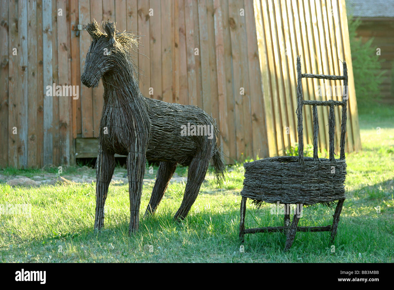 A willow horse and a chair sculptures Poland Stock Photo Alamy