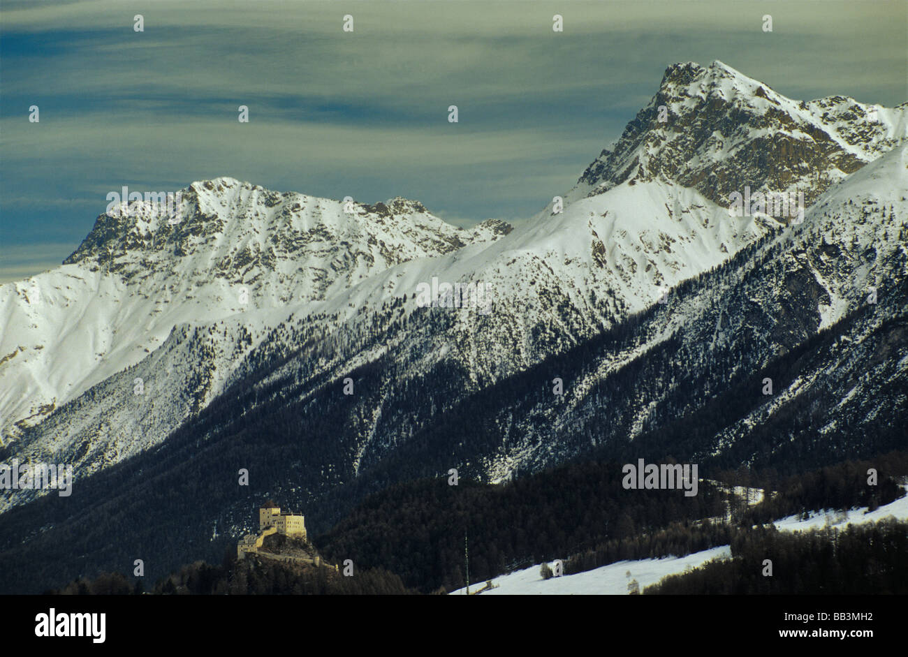 Tarasp Castle and Piz Lischana massif in Unter Engadin valley in Engandine Alps Graubunden Grisons canton Switzerland Stock Photo
