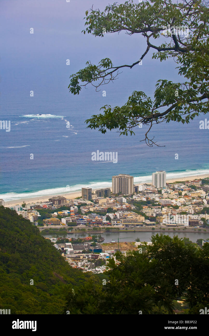 A view on Rio de Janeiro's Barra de Tijuca neighborhood from the Pedra de Gavea mountain in the Atlantic rainforest, Brazil. Stock Photo