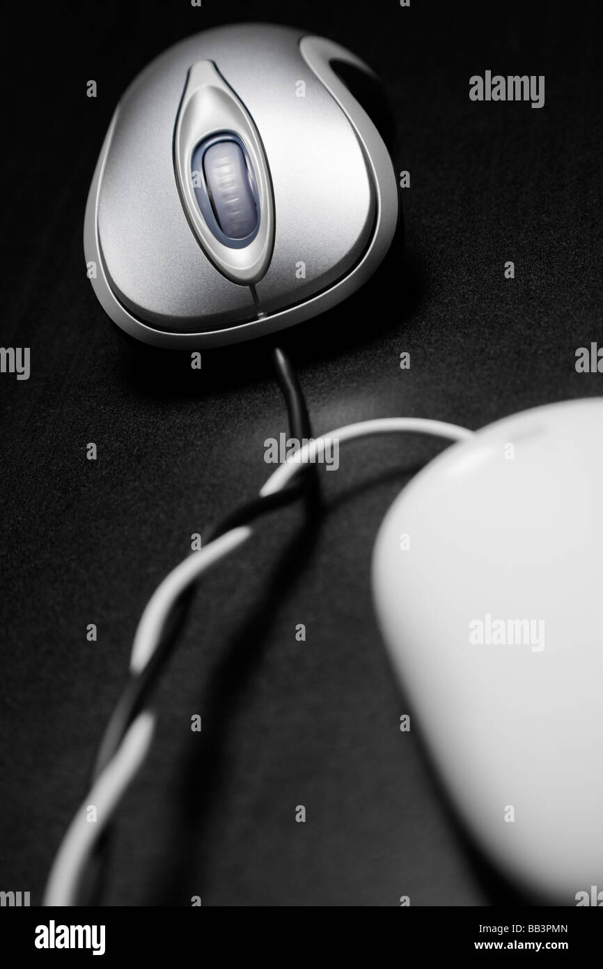 Computer mouse cord tied together Stock Photo Alamy