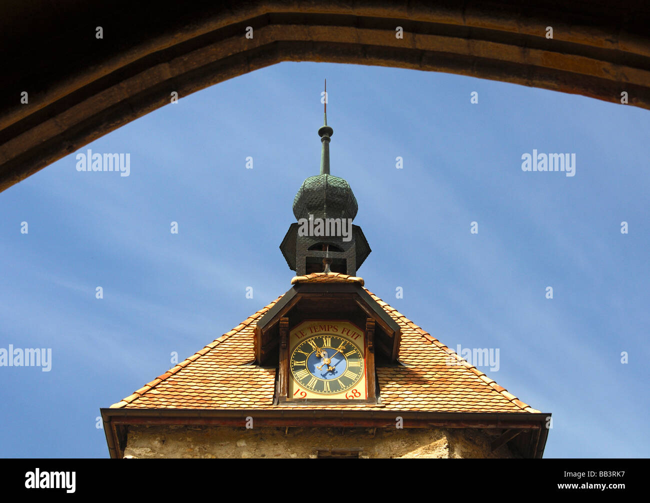 Clock tower of the Romanesque abbey of Romainmotier, canton of Vaud, Switzerland Stock Photo