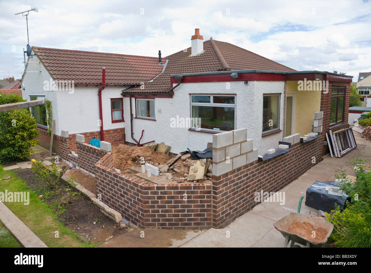 Brick walls of a partly built house extension Stock Photo