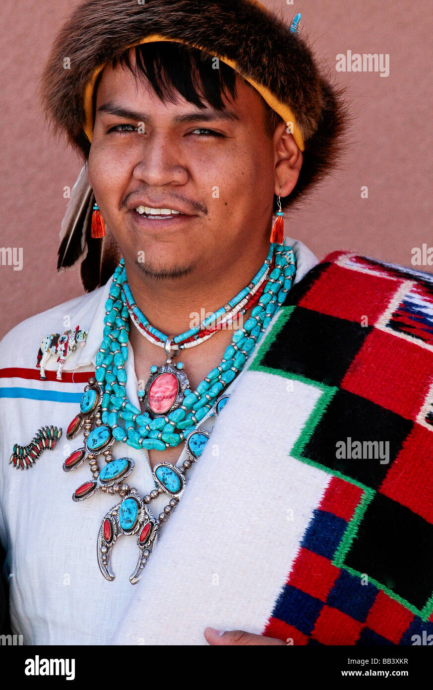 Native American artist Craig Kelly poses in his Native dress Stock ...