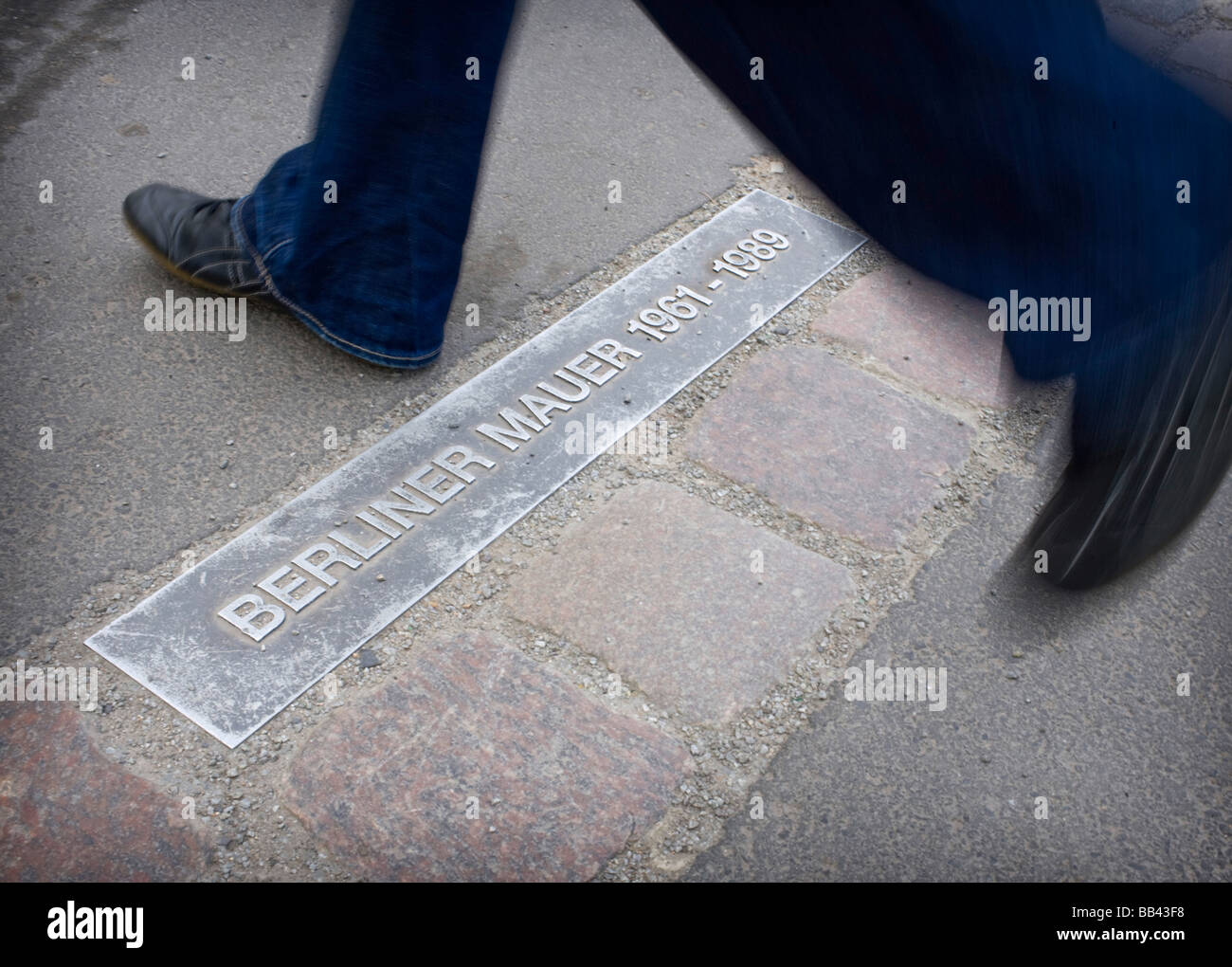 A Person on the former boarder between East and West Berlin Stock Photo