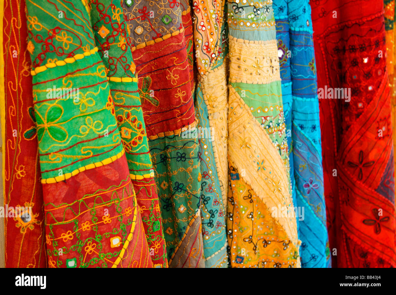 Embroidered fabrics hanging at a market stall in Antalya, Turkey Stock