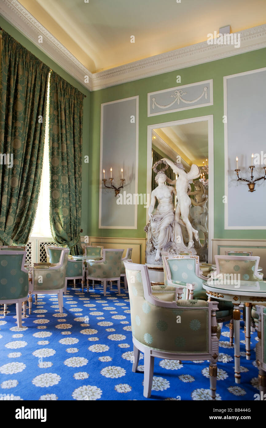 Bar tables and chairs in the green room: Hotel Villa d'Este, Cernobbio, Como, Italy Stock Photo