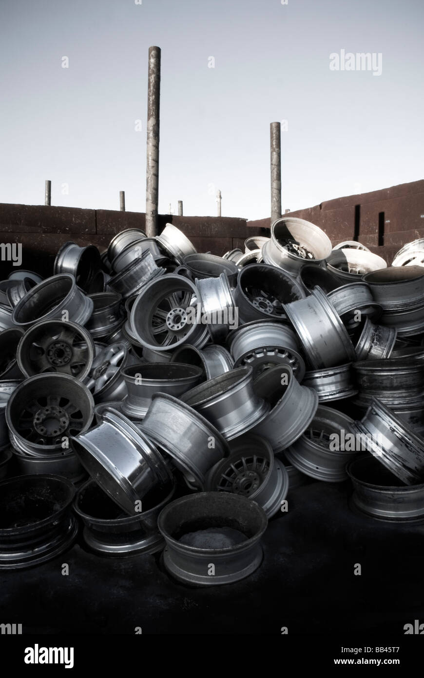 Pile of wheel rims at a recycling facility, Maine Stock Photo Alamy