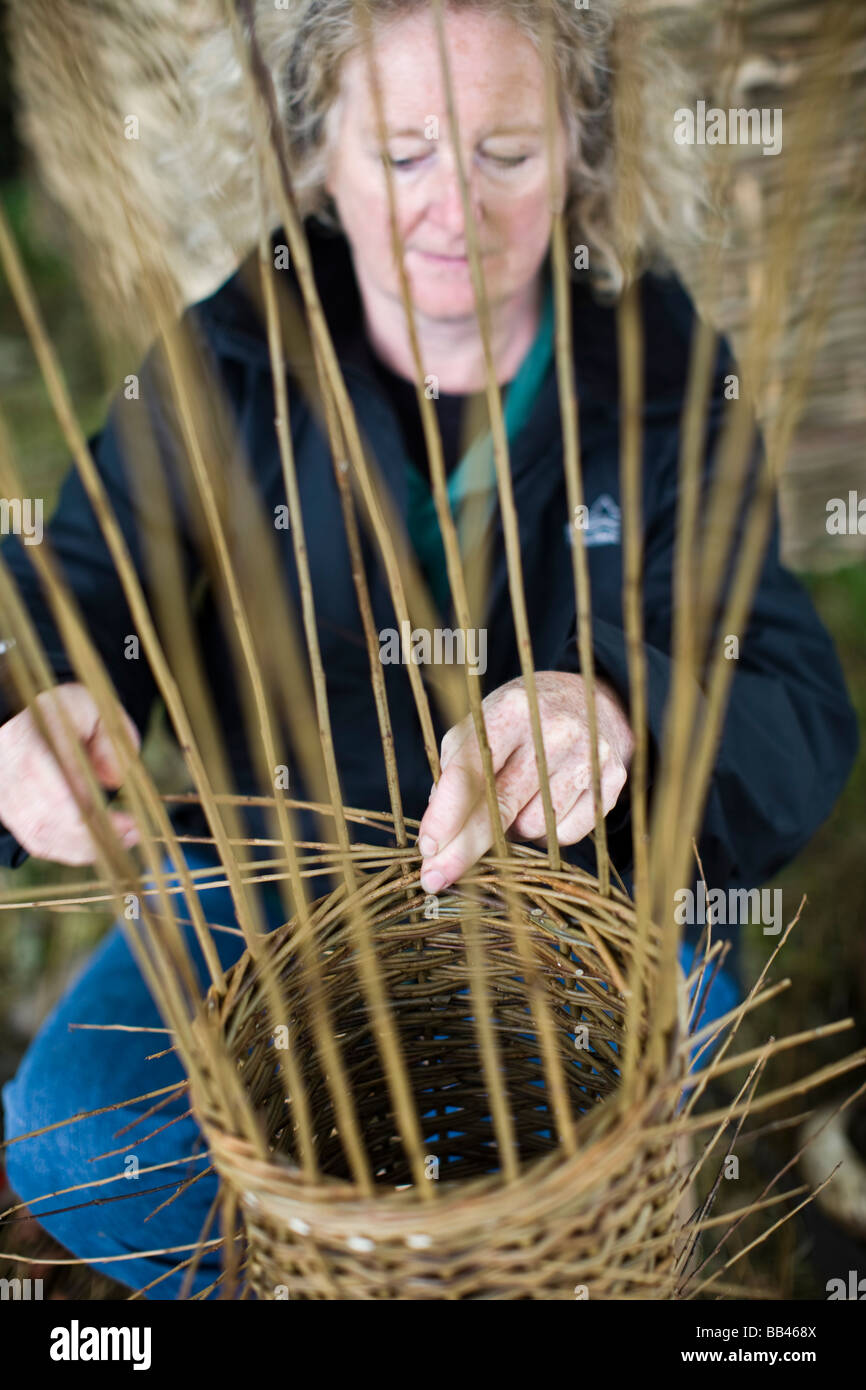 Woman making a basket Stock Photo