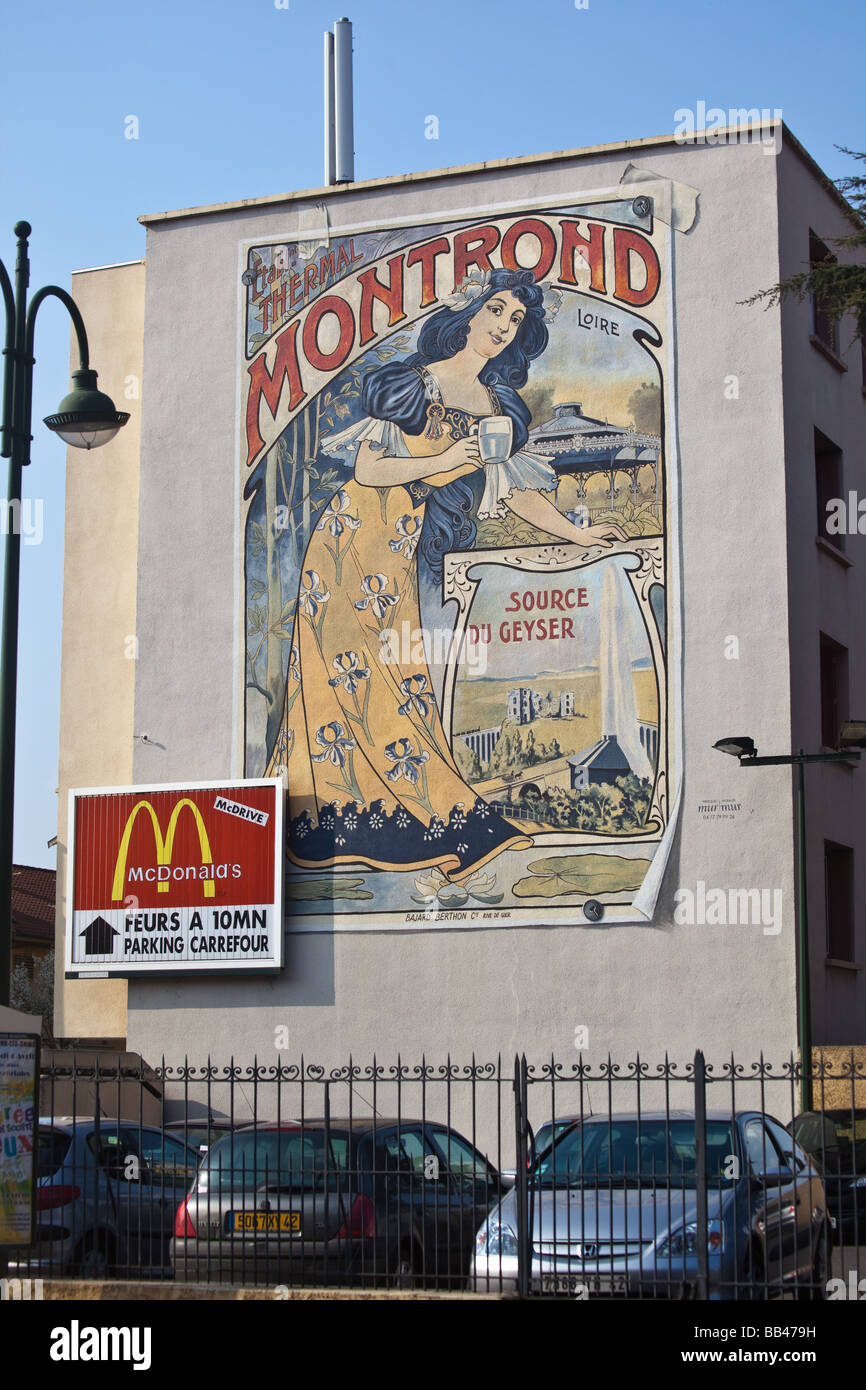 Mural on wall at main crossroads in Montrond Les Bains near Saint Etienne France Stock Photo