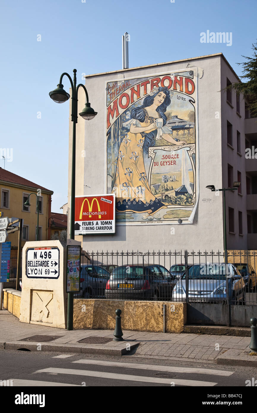 Mural on wall at main crossroads in Montrond Les Bains near Saint Etienne France Stock Photo