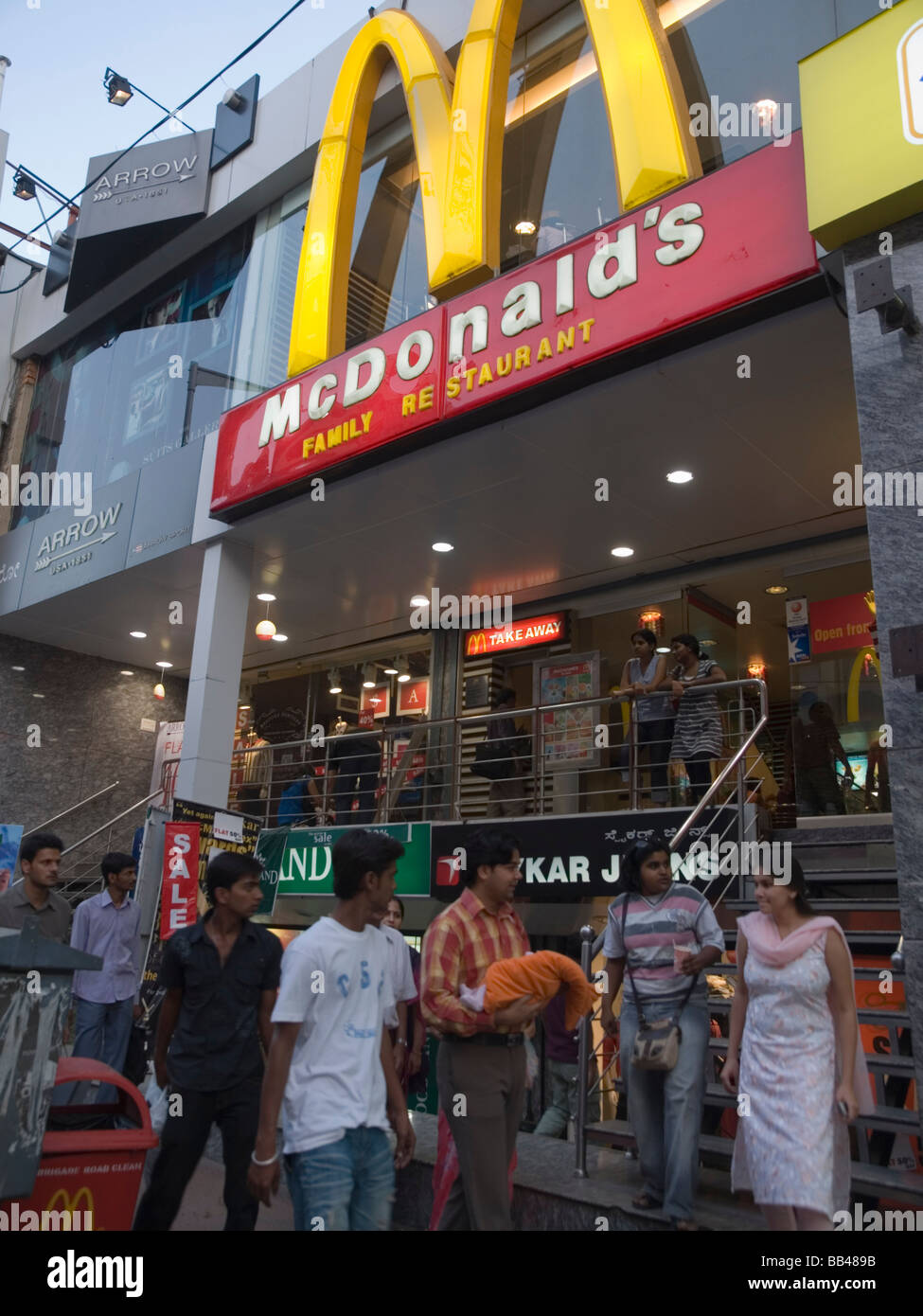 Multinational brand (McDonalds) logo on Brigade road, a main shopping street in Bangalore, Karnataka, India Stock Photo