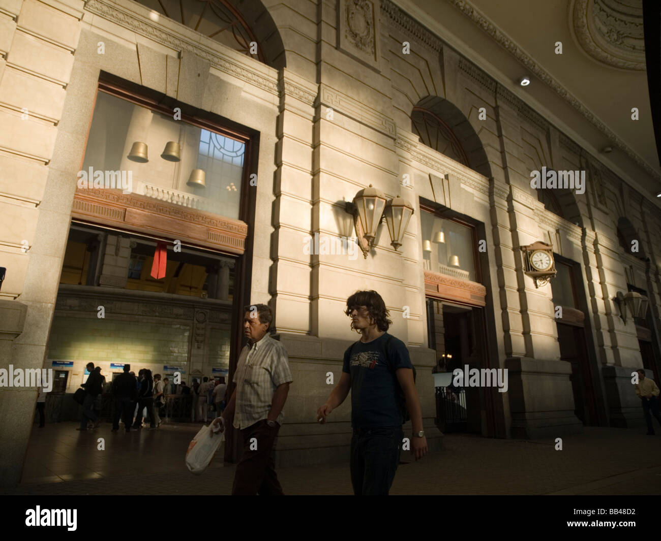 Travelers in main train station in Buenos Aires, Argentina. Stock Photo