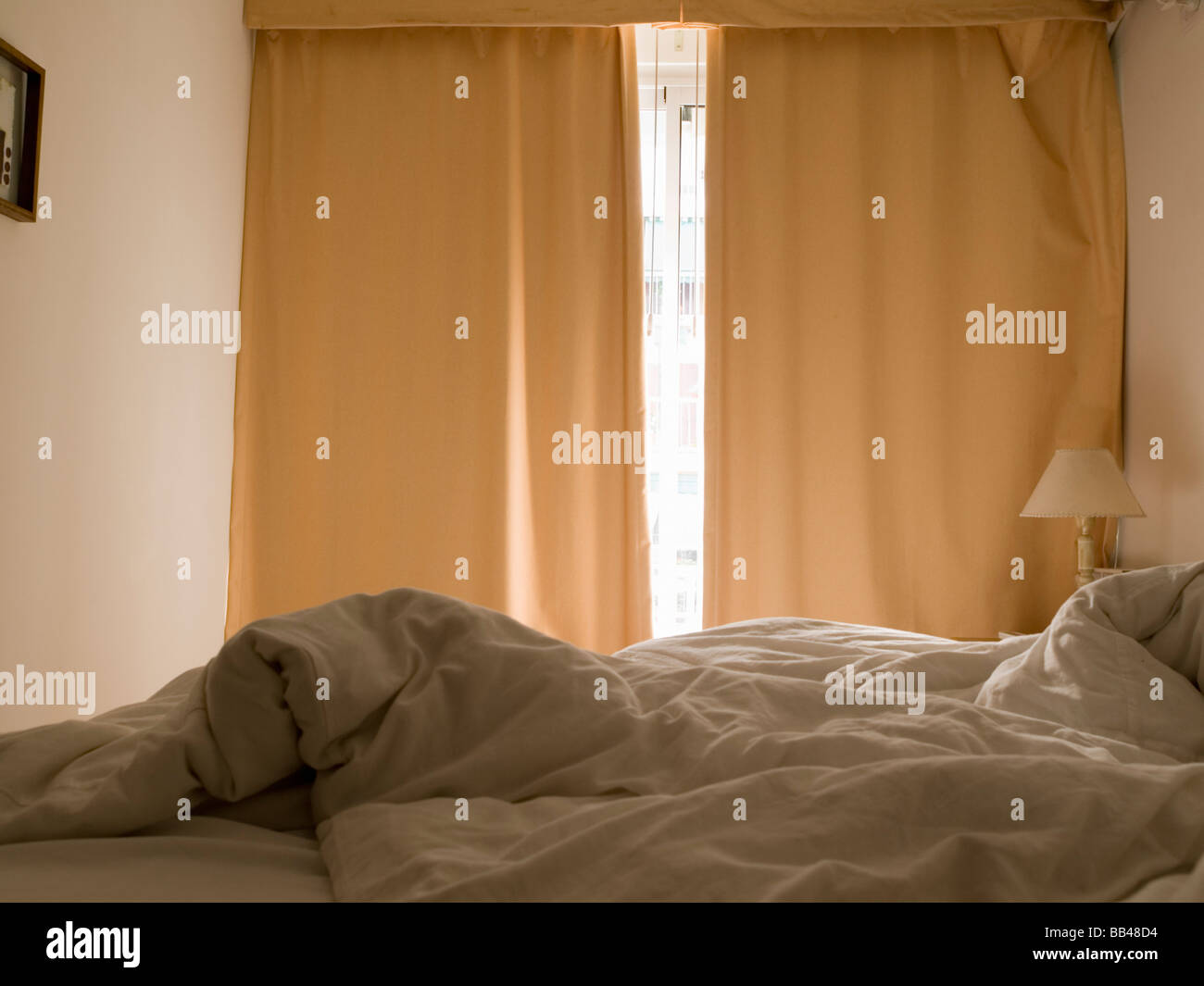 Bed with sheets in Buenos Aires, Argentina. Stock Photo
