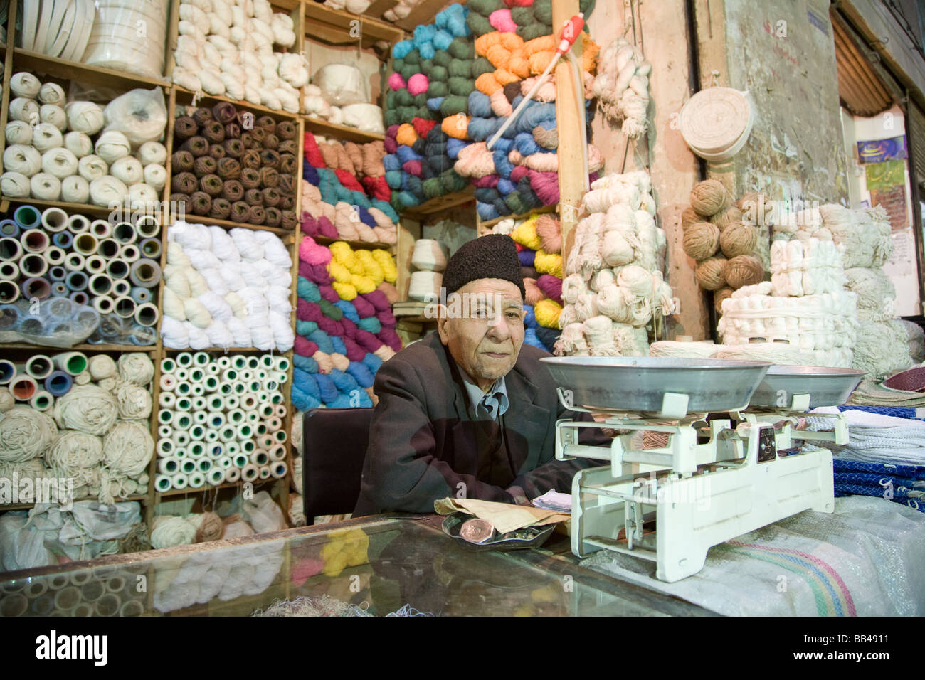Cotton and wool salesman in Esfahan bazaar in Iran. Stock Photo
