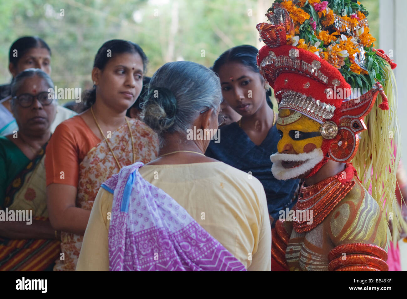 Sree Muthappan Theyyam as Vishnu in Kerala, India Stock Photo - Alamy