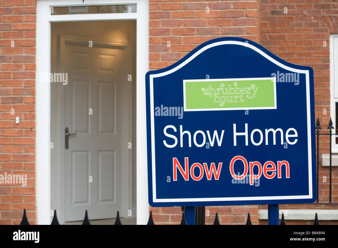 Sign to show home outside a newly built house on a housing estate in England Stock Photo