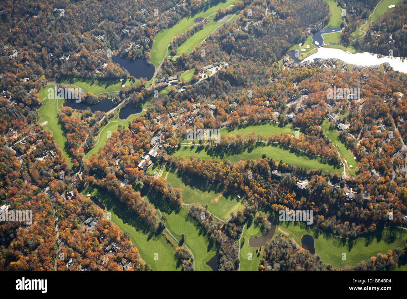 Aerial view of the golf course at the Wildcat Cliffs Country Club under fall colors near Cashiers, NC Stock Photo