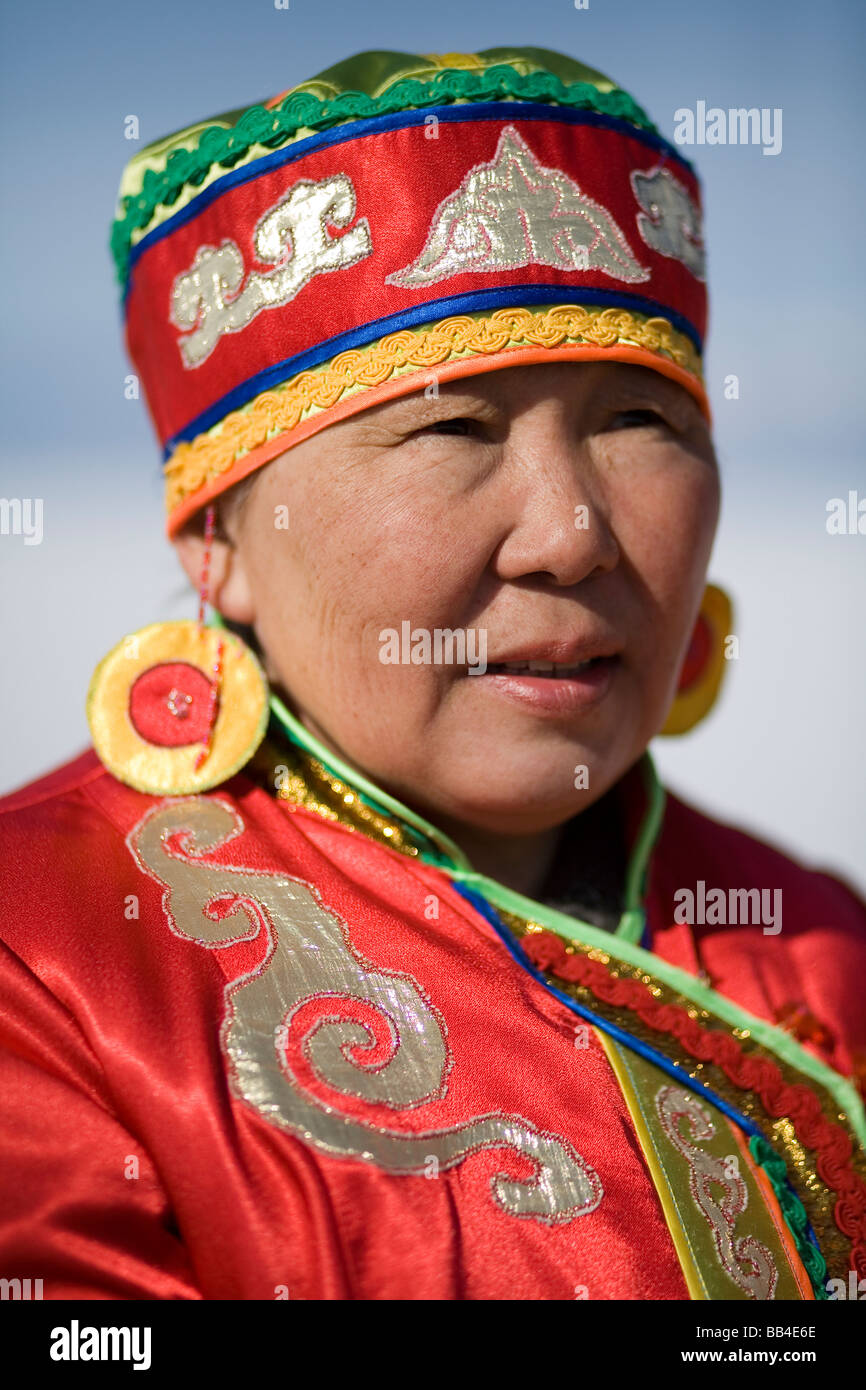 A local Buryat woman involved in a traditional wedding ceremony on ...