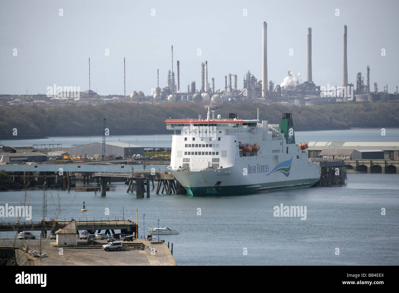 Town of Milford Haven, Wales. Ferry berthed alongside the Cleddau ferry terminal with the Texaco Oil Refinery in the background. Stock Photo