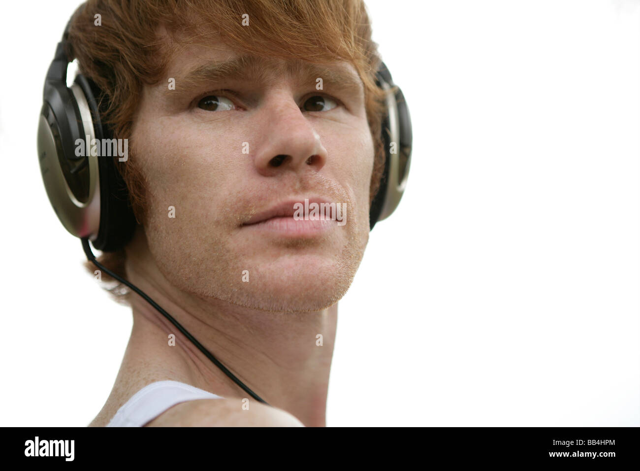 Portrait of of young man with headphone Stock Photo
