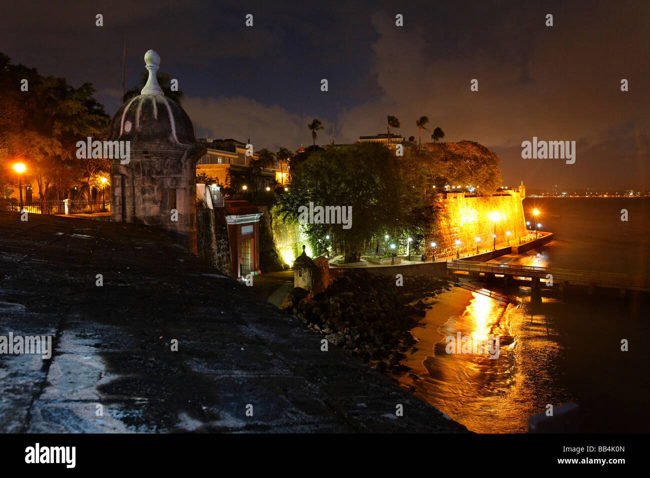 Night City View of Old San Juan with the City Gate La Fortaleza and the Paseo De La Princesa Puerto Rico Stock Photo