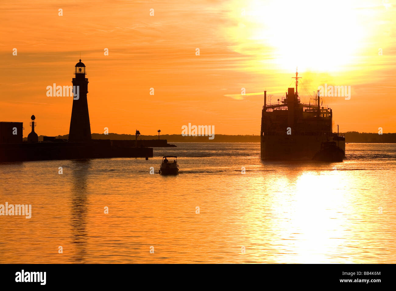 Buffalo Lighthouse and Cement Carrier in Buffalo at sunset; Buffalo, New York State, USA Stock Photo - Alamy