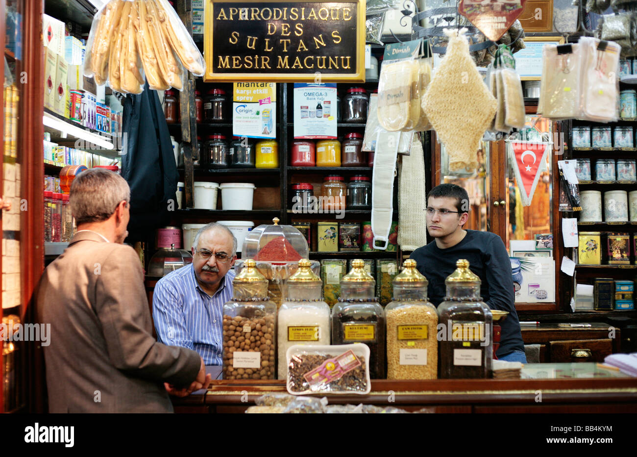 Men sitting in a chemist and aphrodisiac shop in Istanbul s Spice