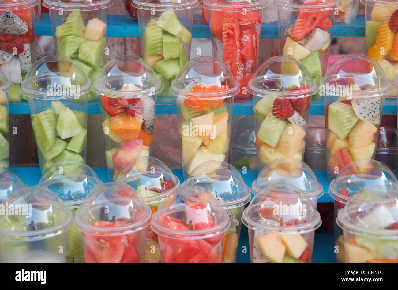 Fresh fruit ready for making a smoothie packed in plastic cups Chiang