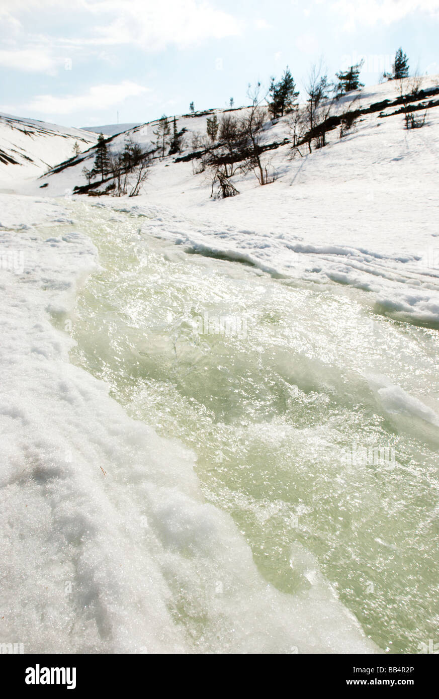 Meltwater stream from hills, Lapland, Finland Stock Photo