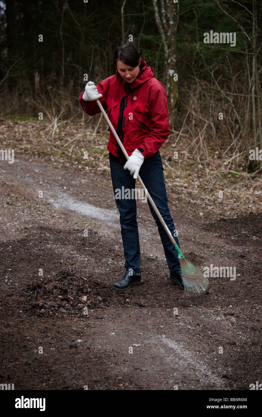 Person with a rake Stock Photo