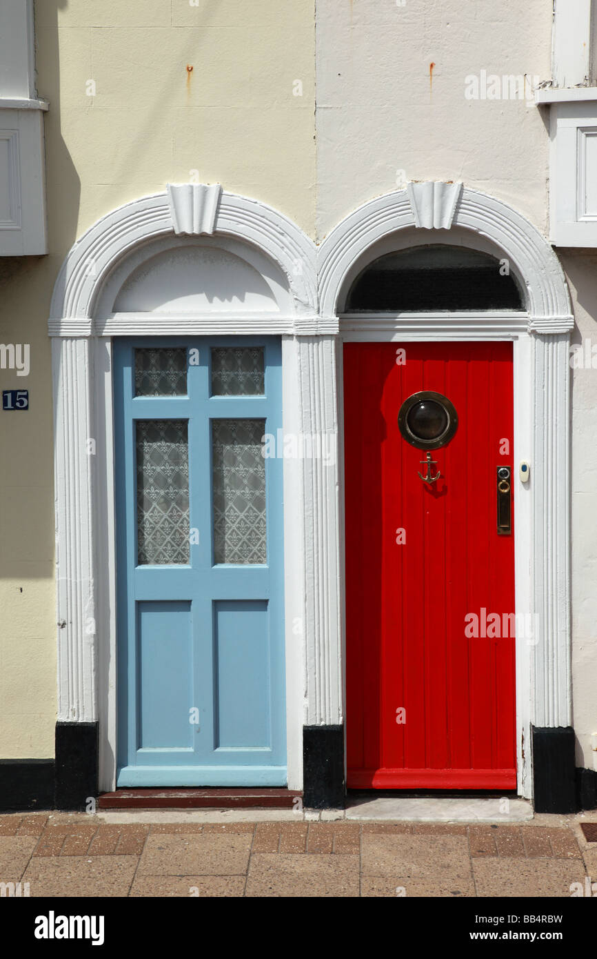 Close up of blue and red front doors in Weymouth, Dorset, England, UK Stock Photo