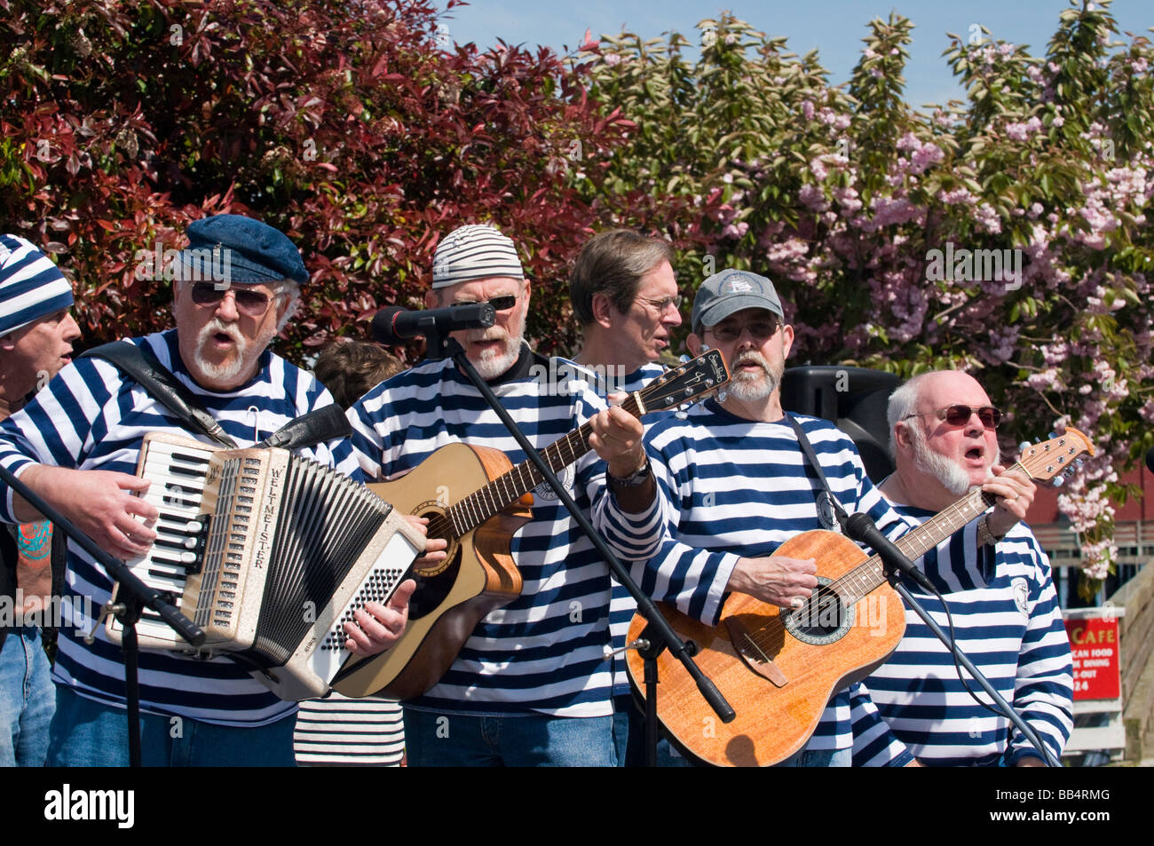 USA, WA, Whidbey Island. Penn Cove Water Festival. Shifty Sailors open festival with their sea chantey music. Stock Photo