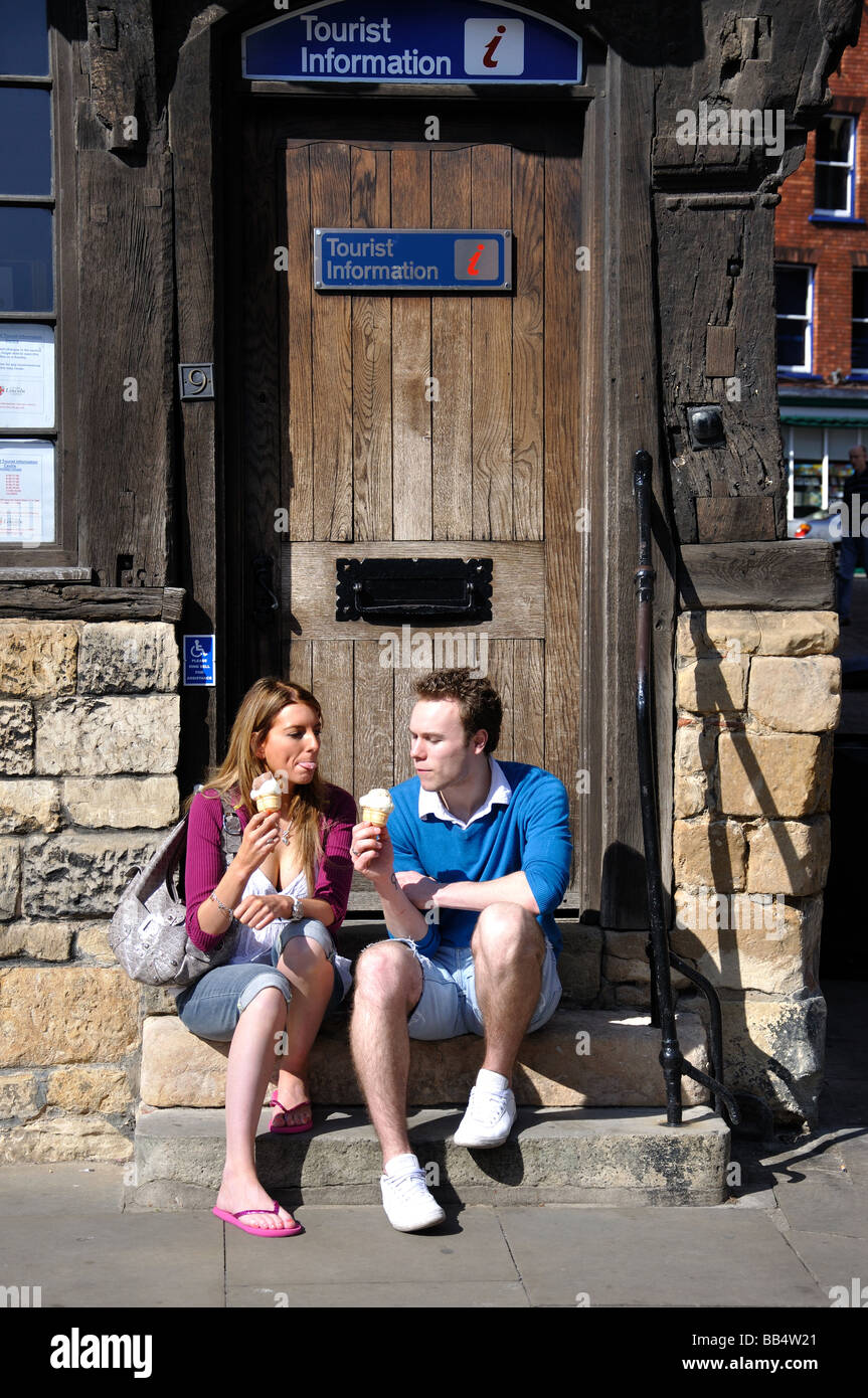 Couple on doorstep, Leigh-Pemberton House, Castle Hill, Lincoln, Lincolnshire, England, United Kingdom Stock Photo