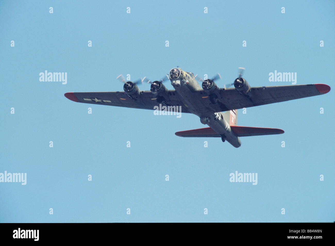 B-17 G Flying Fortress flying above the field Stock Photo