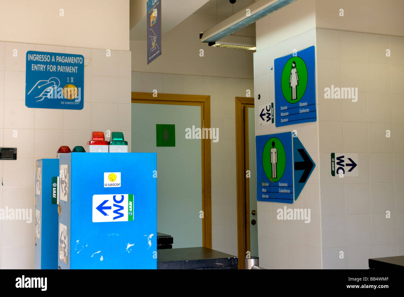 Europe, Italy, Venice. Public toilets with numerous signs Stock Photo