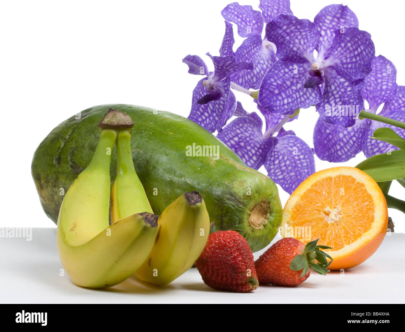 tropical fruit with an orchid Stock Photo