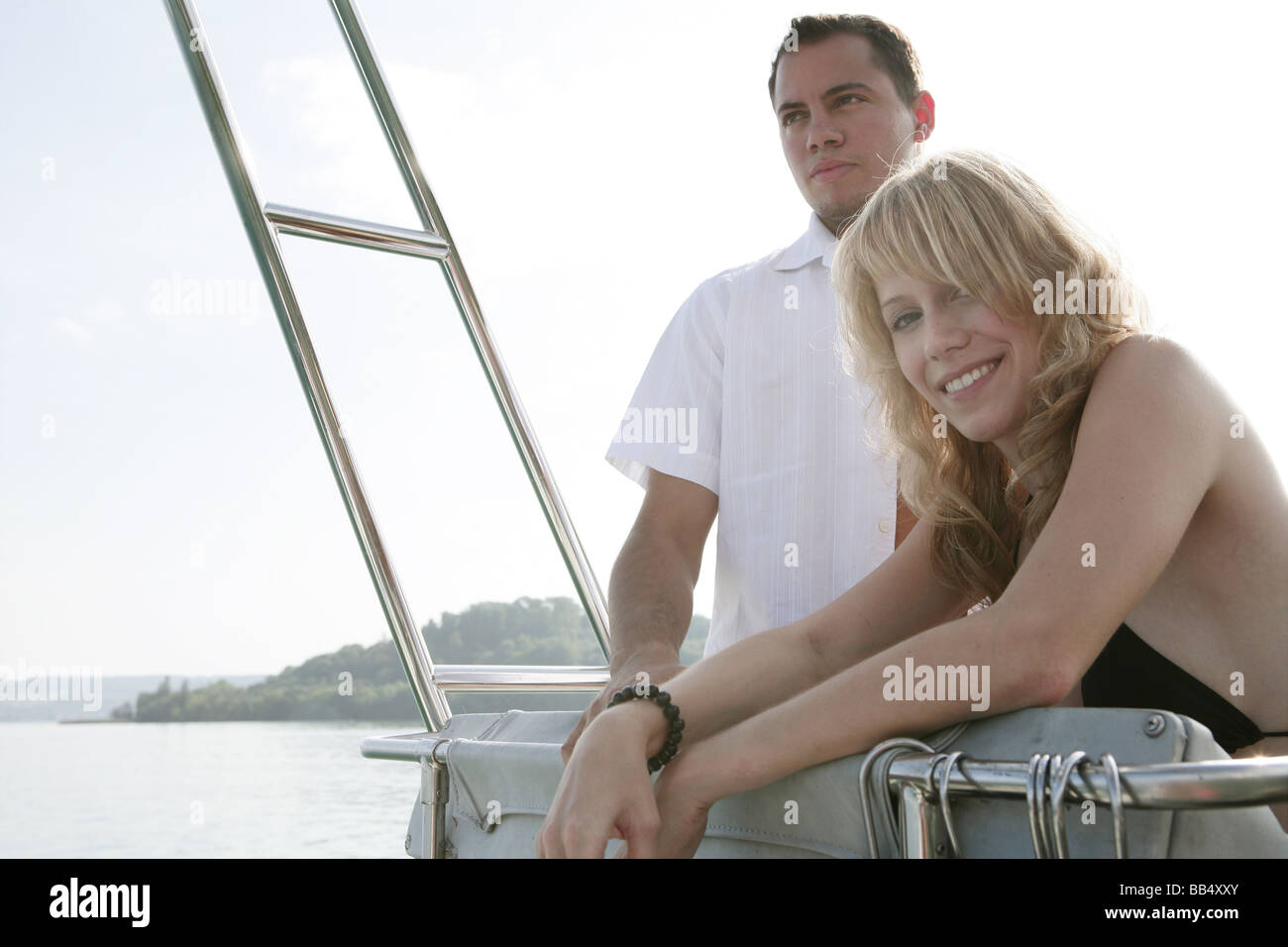 Portrait of a young couple on a yacht Stock Photo
