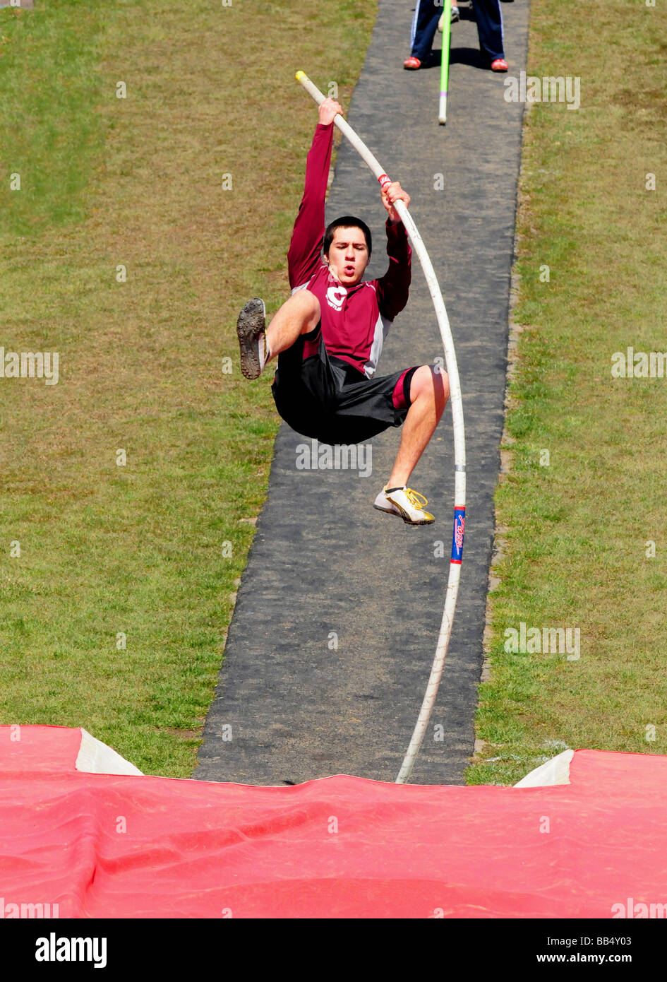 A pole vaulter makes his approach Stock Photo Alamy