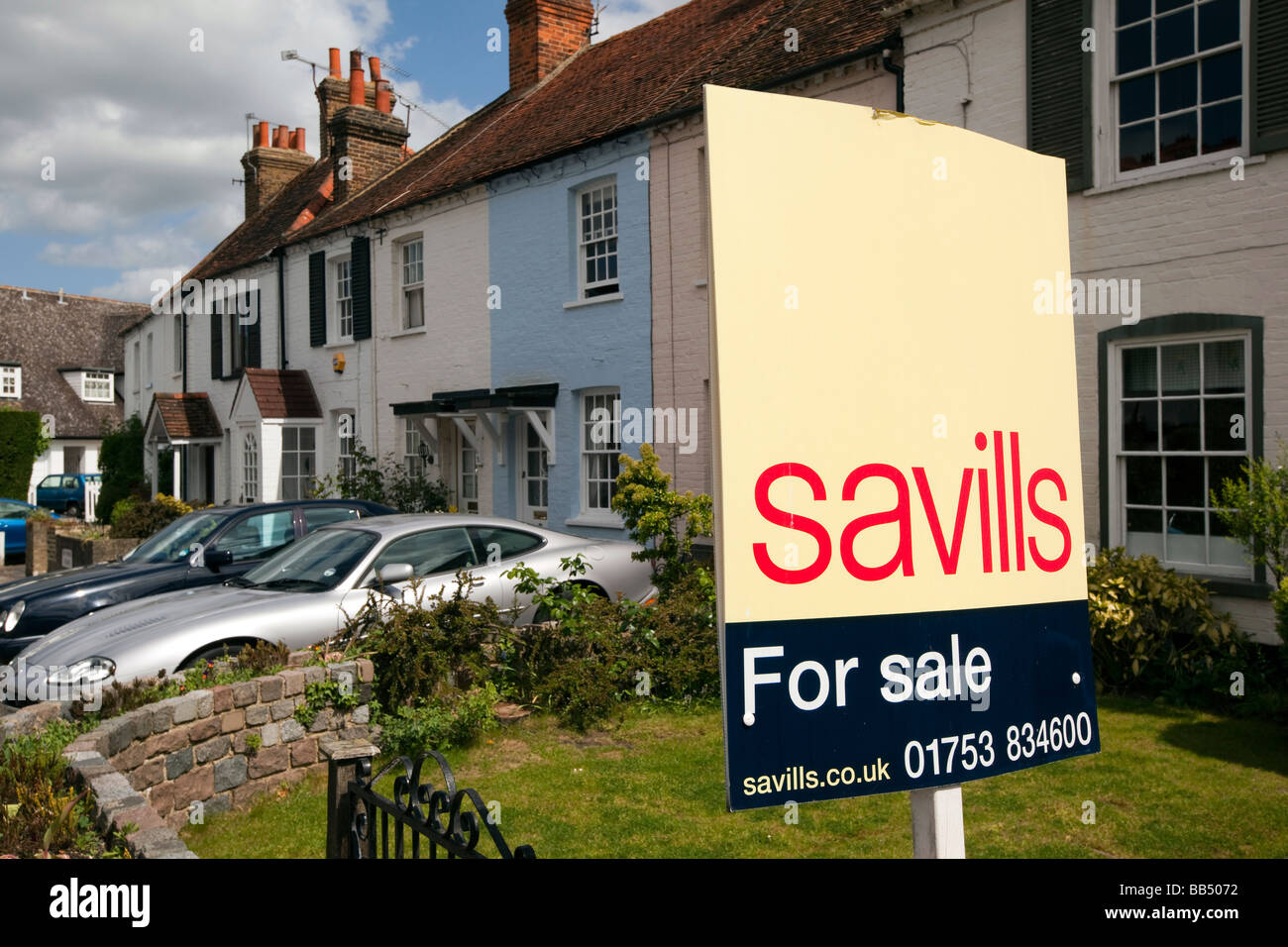 England Berkshire Bray Village Ferry Road Savills estate agents sign outside cottage for sale Stock Photo