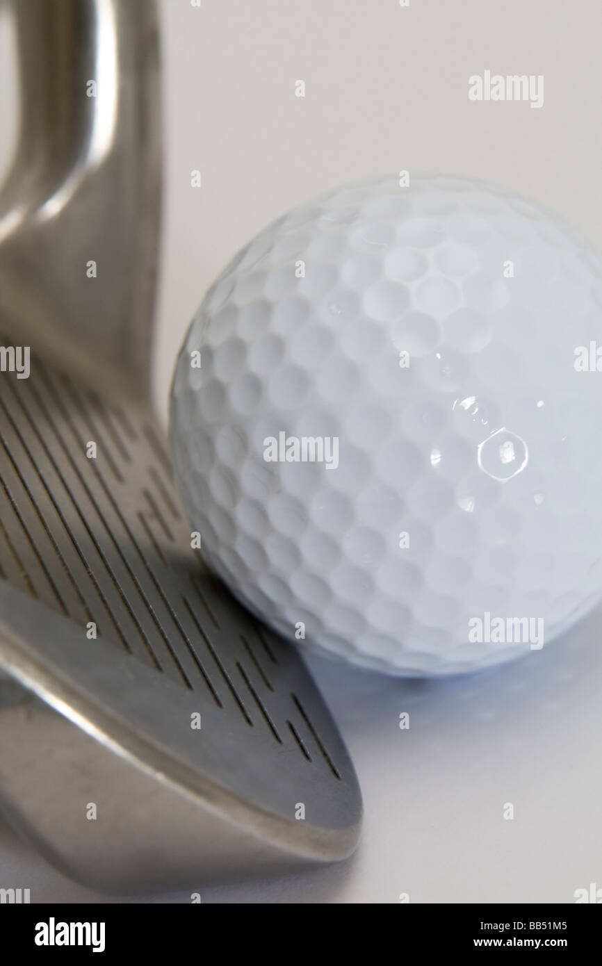 Golf equipment Sand iron and ball Stock Photo Alamy