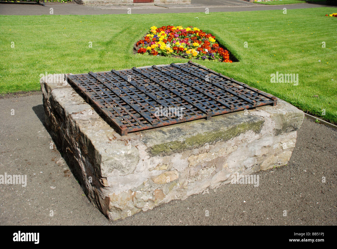 Well cover at Inverkeithing Stock Photo