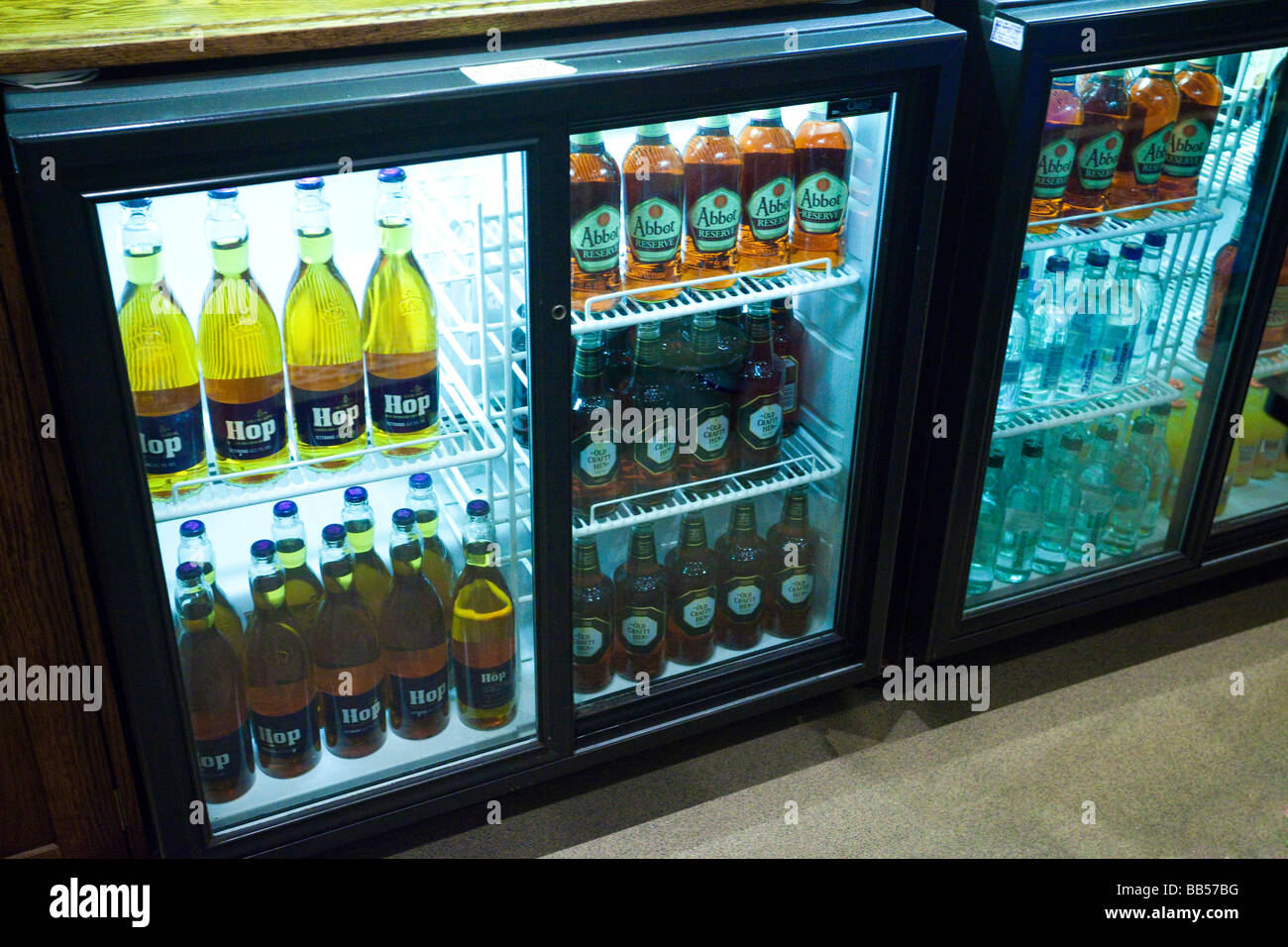 chilled cabinet with bottles of beer Stock Photo