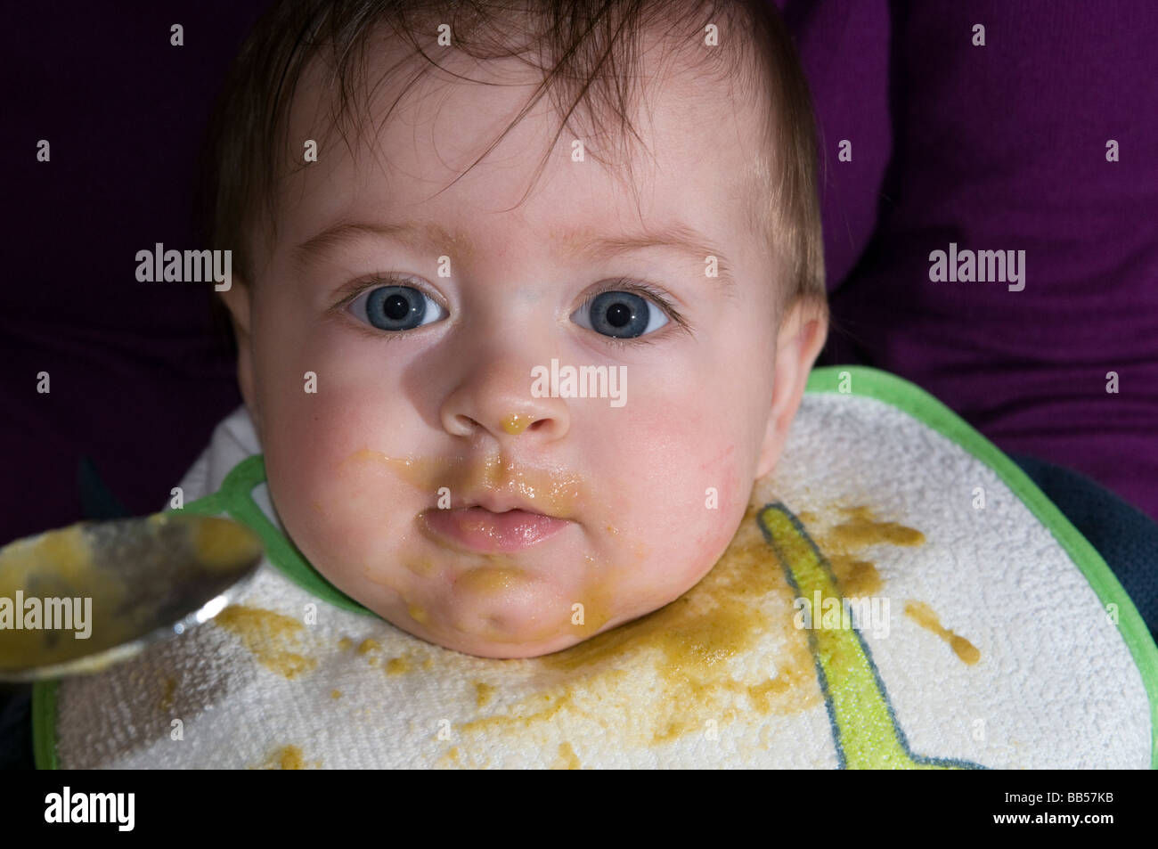 six month old baby eating soup Stock Photo Alamy